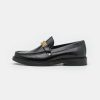 * | Moschino Slip-Ons Nero