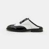 * | Moschino Brogue Group Clogs Black/White