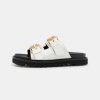 * | Moschino Buckle Mules Bianco