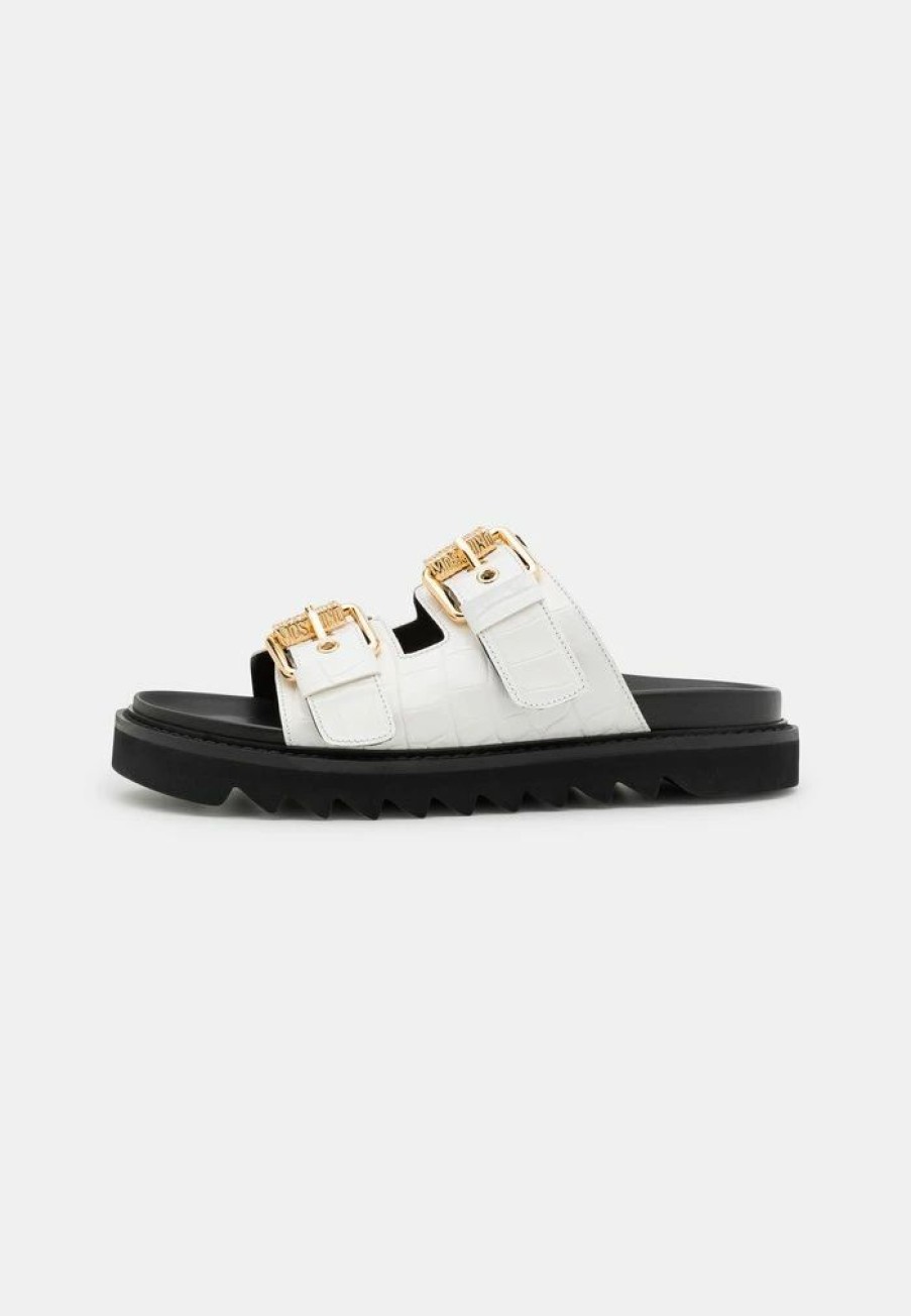 * | Moschino Buckle Mules Bianco