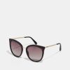 * | Moschino Sunglasses Havana