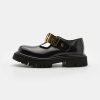 * | Moschino Slip-Ons Nero