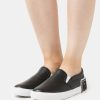 * | Moschino Slip-Ons Nero