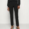 * | Moschino Trousers Trousers Black