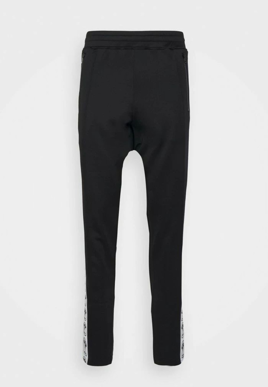 * | Moschino Trousers Trousers Black